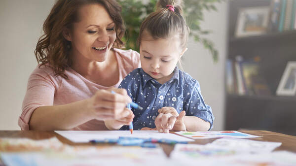 Mother and child hugging